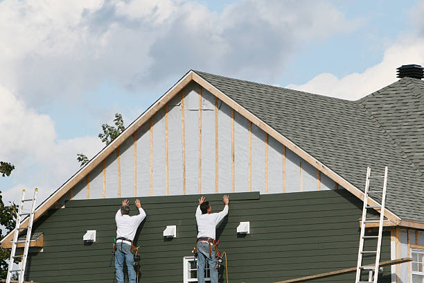 Professional Siding Replacement technician working in Graham, NC
